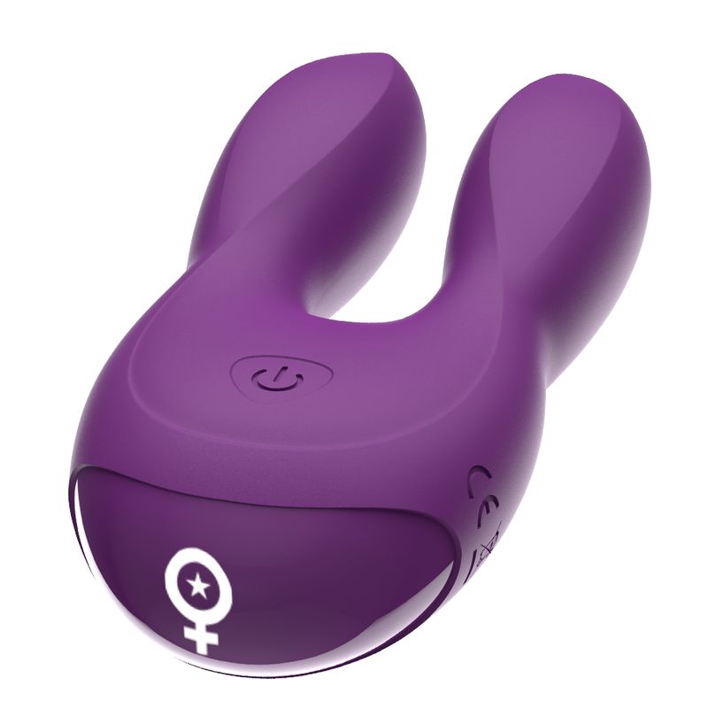 Lila Stimulator mit zwei Flügeln. Power-Symbol und weibliches Symbol sichtbar.