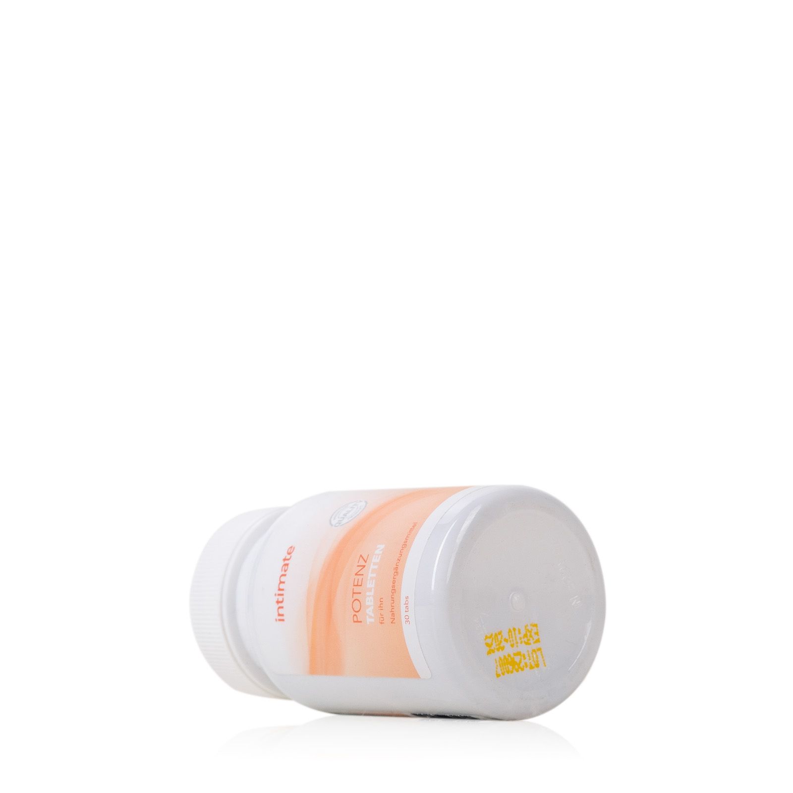 Flasche "POTENZ Tabletten" liegt. Etikett sichtbar.