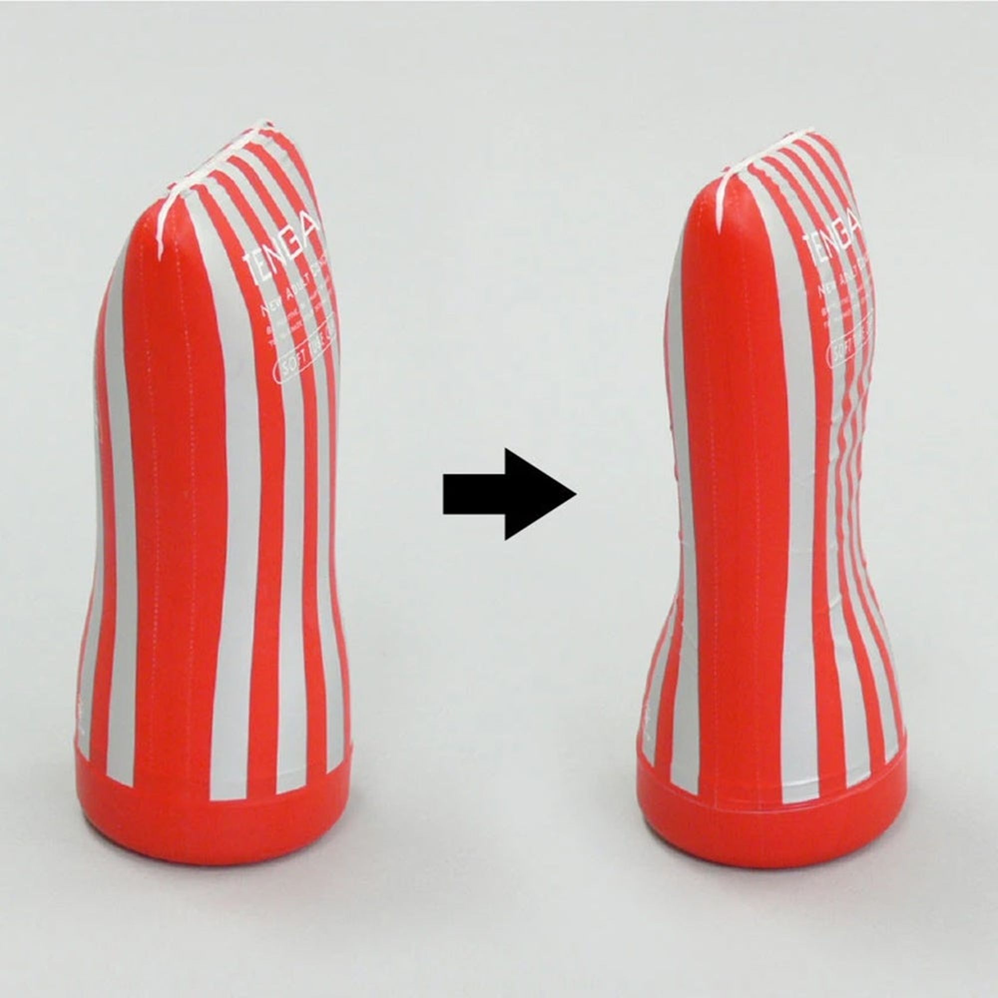 Zwei Ansichten des TENGA Soft Tube Cup. Roter Körper mit weißen Streifen. Pfeil zeigt Veränderung.