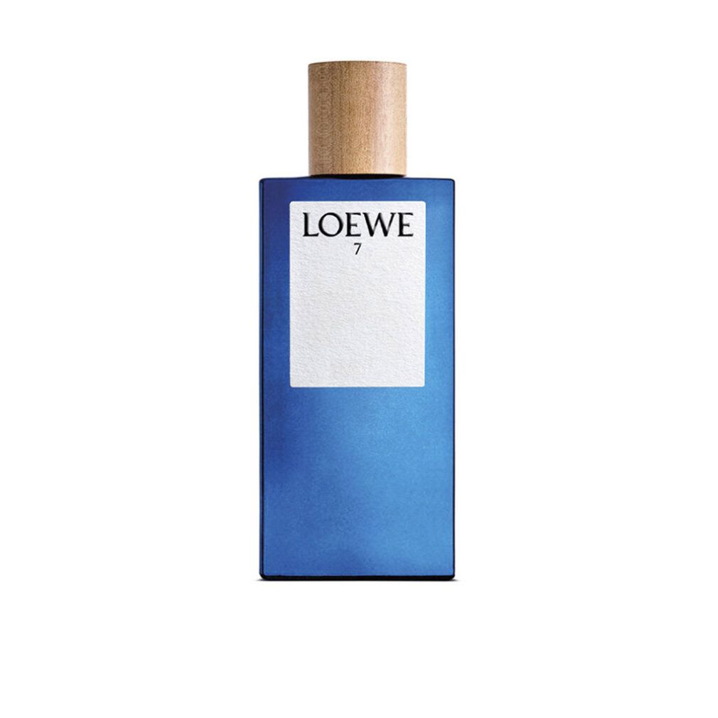 Blaues Parfümflakon mit Holzdeckel. Auf weißem Etikett steht "LOEWE 7". Rechteckige Form.