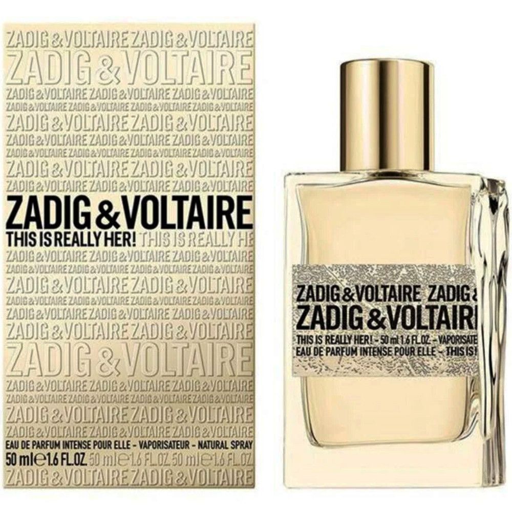 ZADIG & VOLTAIRE Eau de Parfum mit Verpackung. Flakon und Schachtel. Aufschrift: THIS IS REALLY HER! und Markenname. Goldfarbener Verschluss.