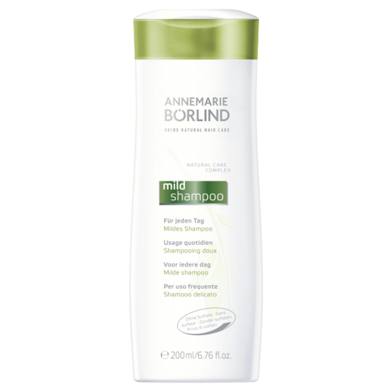 Shampoo-Flasche, weiß mit grünem Deckel. Aufschrift: ANNEMARIE BÖRLIND, mild shampoo. Mehrsprachiger Text.