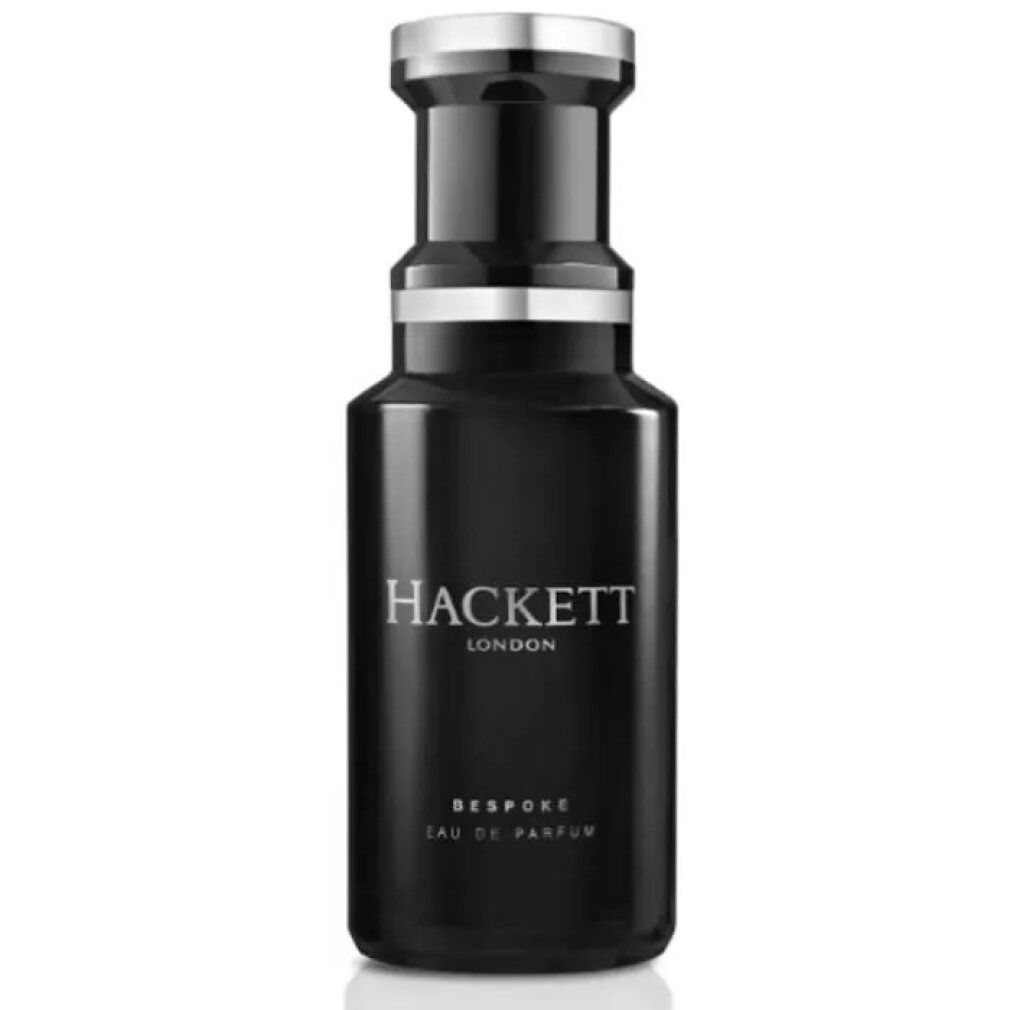 Schwarze Flasche mit silbernem Deckel. Aufschrift: HACKETT LONDON, BESPOKE, EAU DE PARFUM.
