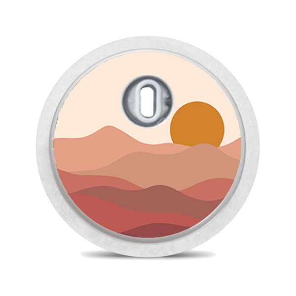 Runder Aufkleber mit Sonne und Berglandschaft. Beige, braune Farbtöne. Für medizinische Geräte.