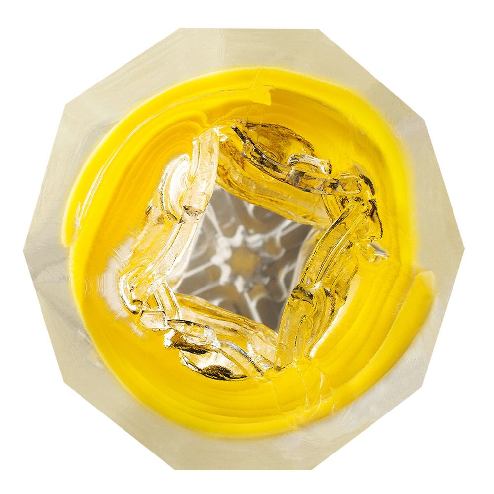 Draufsicht auf ein Produkt mit gelben Spiralen und innerer Struktur. Achteckiger Hintergrund.