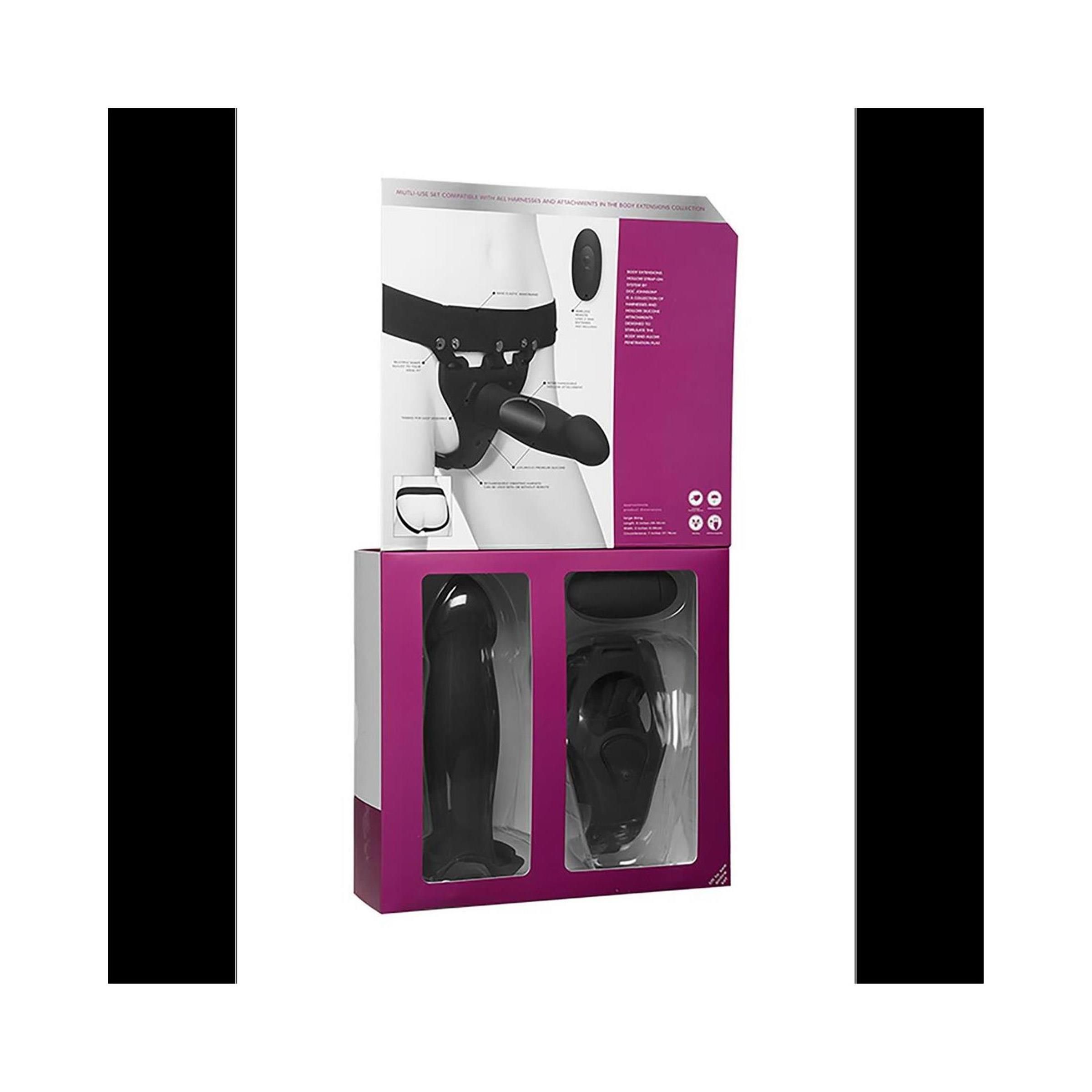 Verpackung mit schwarzem Harness und Dildo. Innenansicht: Dildo und Fernbedienung. Verpackung in Pink.