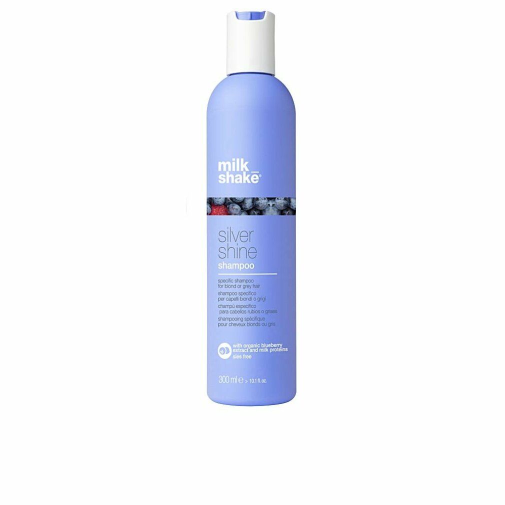 Flasche Shampoo, blau, weißer Deckel. Aufschrift: milk_shake, Silver Shine Shampoo. Text in mehreren Sprachen.