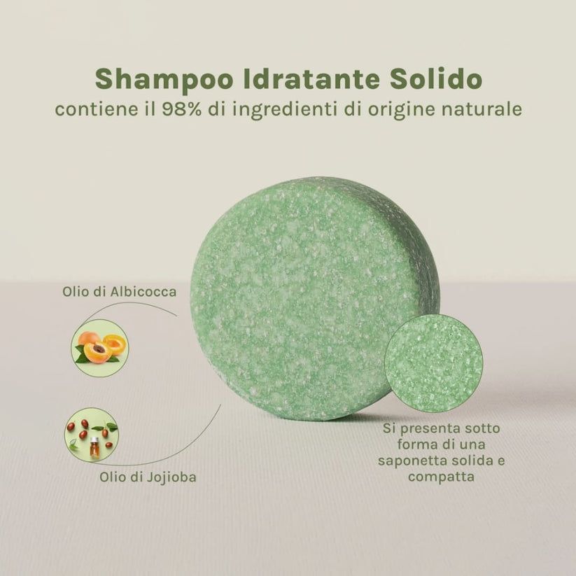 Runder, grüner Shampoo-Block. Text: Shampoo Idratante Solido, 98% natürliche Inhaltsstoffe. Vegan.