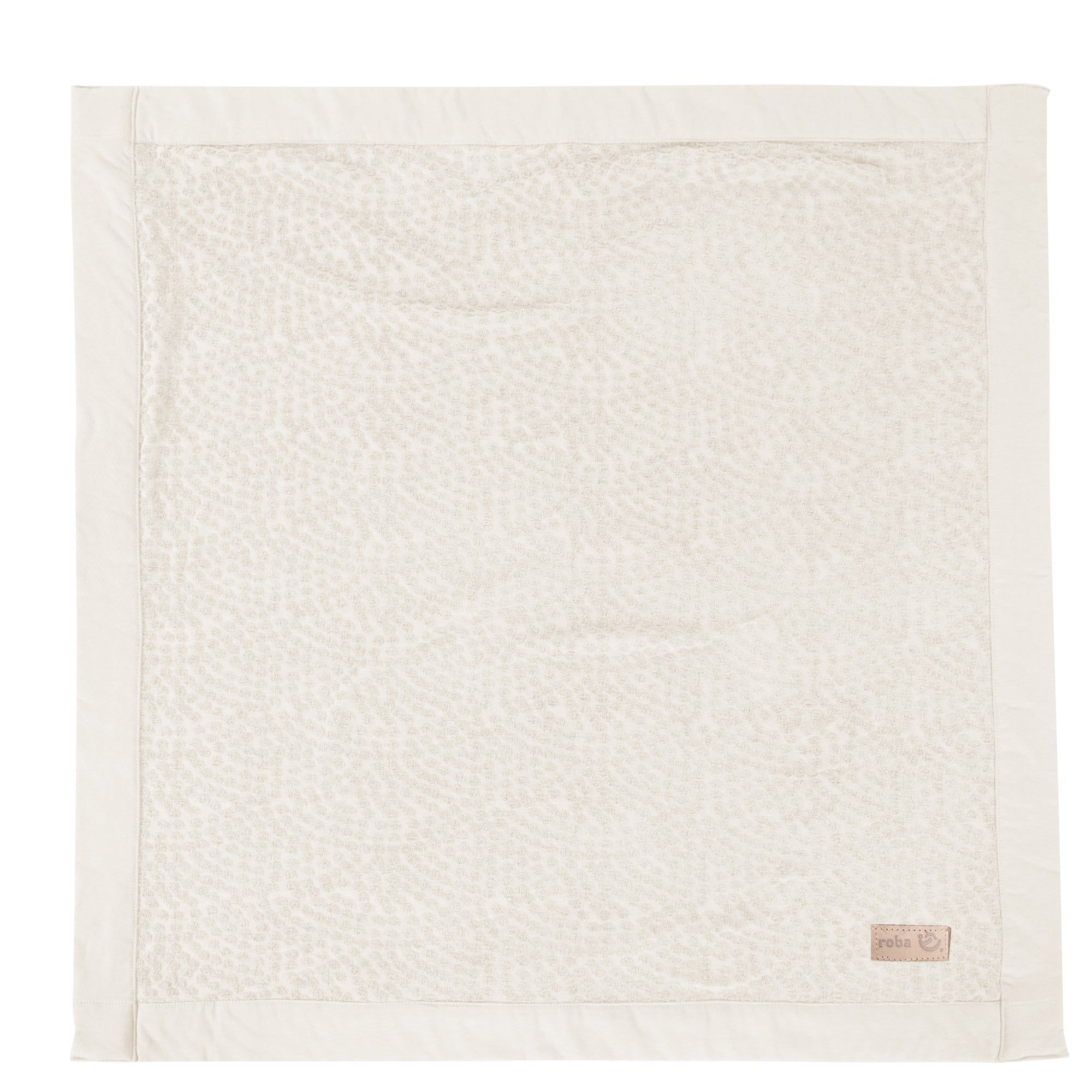 Quadratische Babydecke mit cremefarbenem Rand und gepunktetem Muster. Kleines Label mit Logo. 