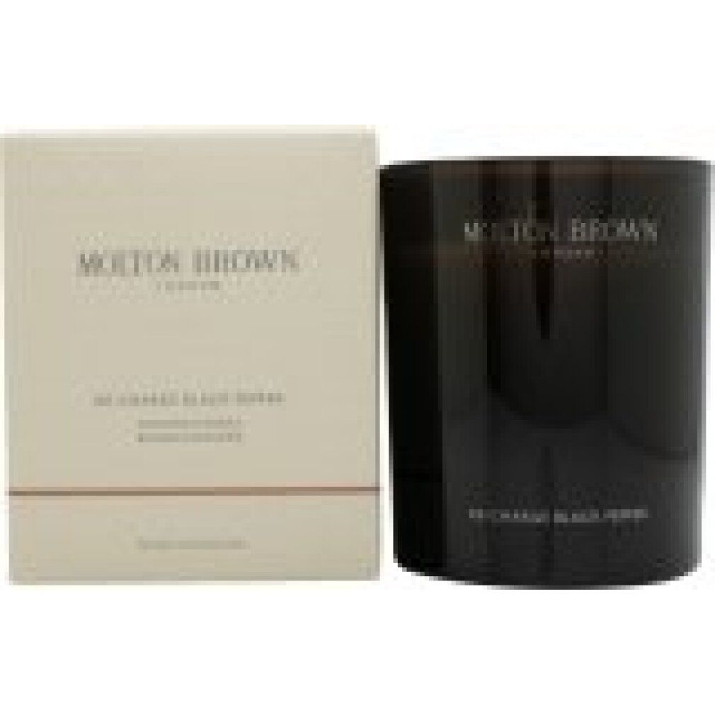 Kerze und Verpackung. Aufschrift: Molton Brown London, Re-Charge Black Pepper, Scented Candle, Bougie Parfumée, Made in England.