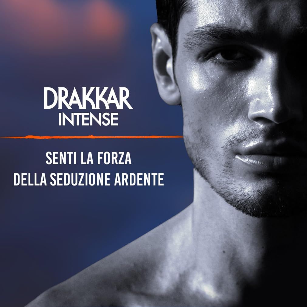 Drakkar Intense Flasche und Verpackung. Schwarze Schachtel mit orangefarbenen Akzenten. Aufschrift: Drakkar Intense, Guy Laroche.