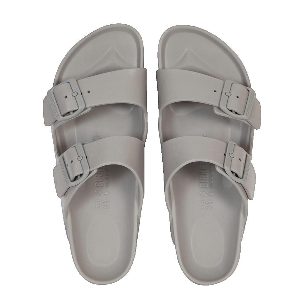 Sandali Birkenstock grigi. Due cinturini con fibbie. Vista dall'alto.