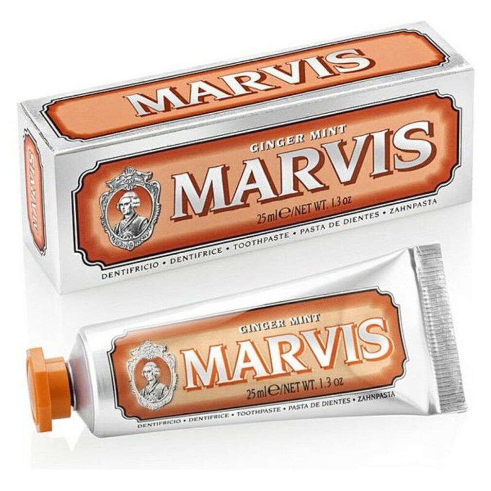 Zahnpasta-Tube und Schachtel. Silberfarben, orangefarbene Akzente. Aufschrift: MARVIS Ginger Mint. 25ml/1.3 oz.