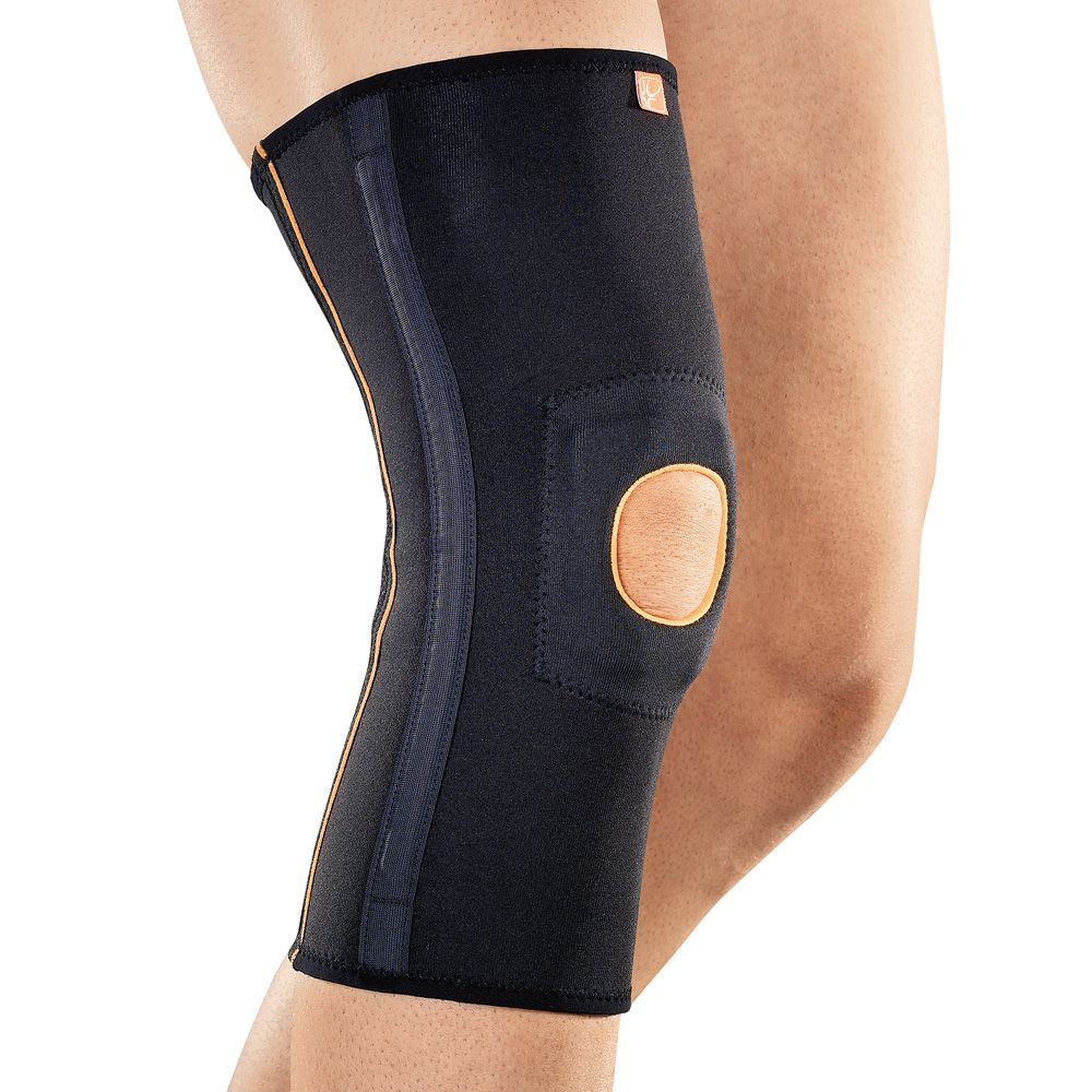 Kniebandage, schwarz mit orangefarbenen Akzenten. Polsterung im Kniebereich. Am Bein getragen.