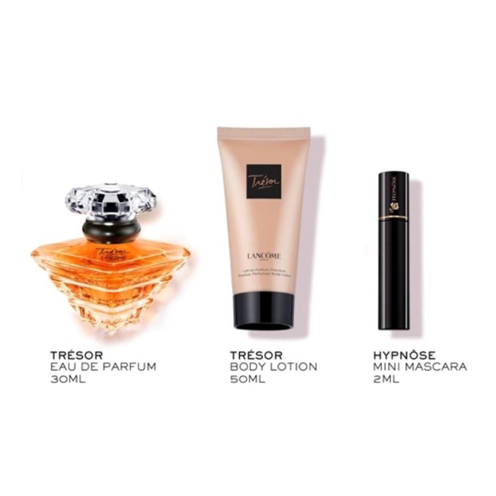 Parfumflakon, Körperlotion und Mascara. Aufschrift 'Trésor Eau de Parfum', 'Trésor Body Lotion' und 'Hypnôse Mini Mascara'.