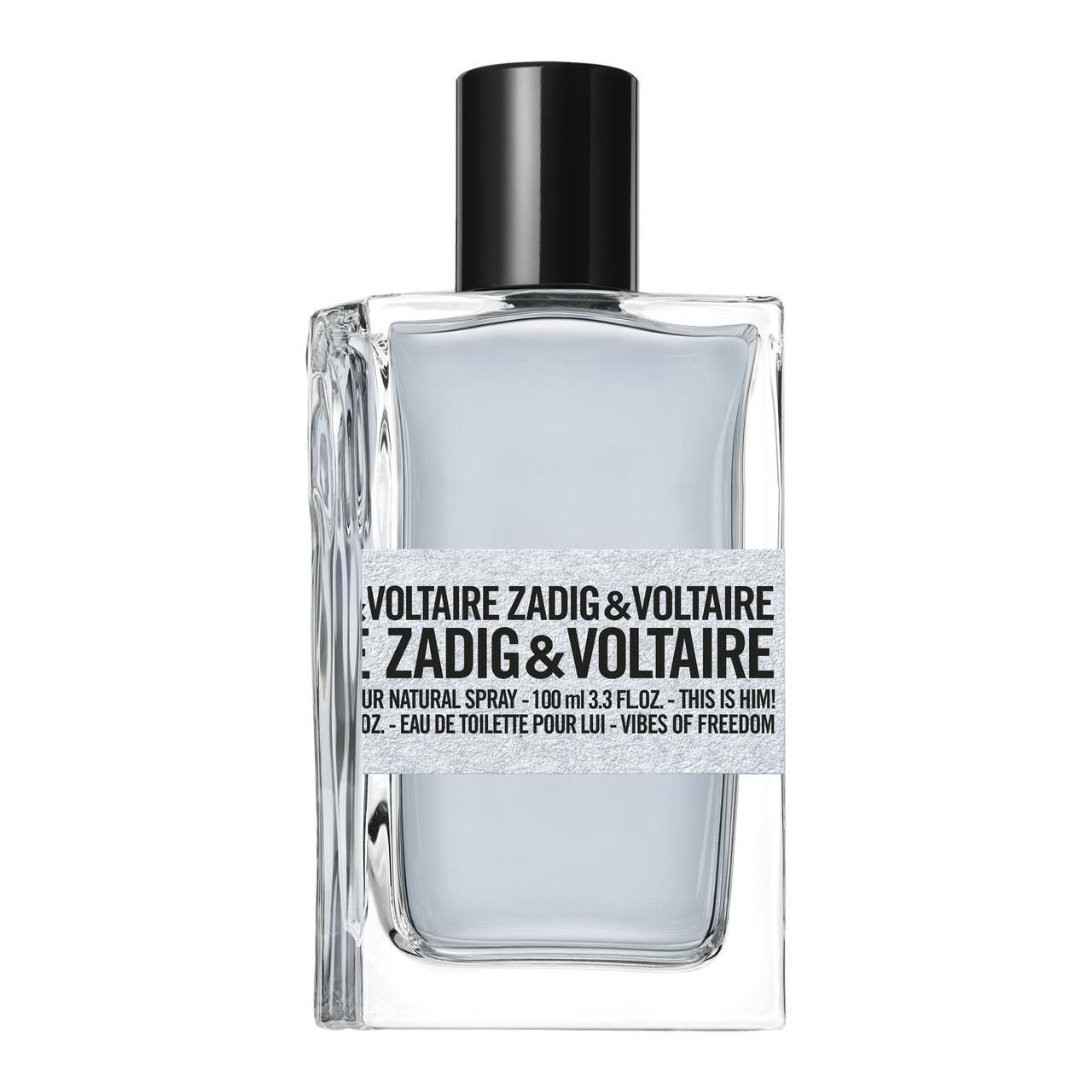 Glasflakon mit weißem Etikett. Schwarzer Verschluss. Text: Zadig & Voltaire, This is Him! Vibes of Freedom.