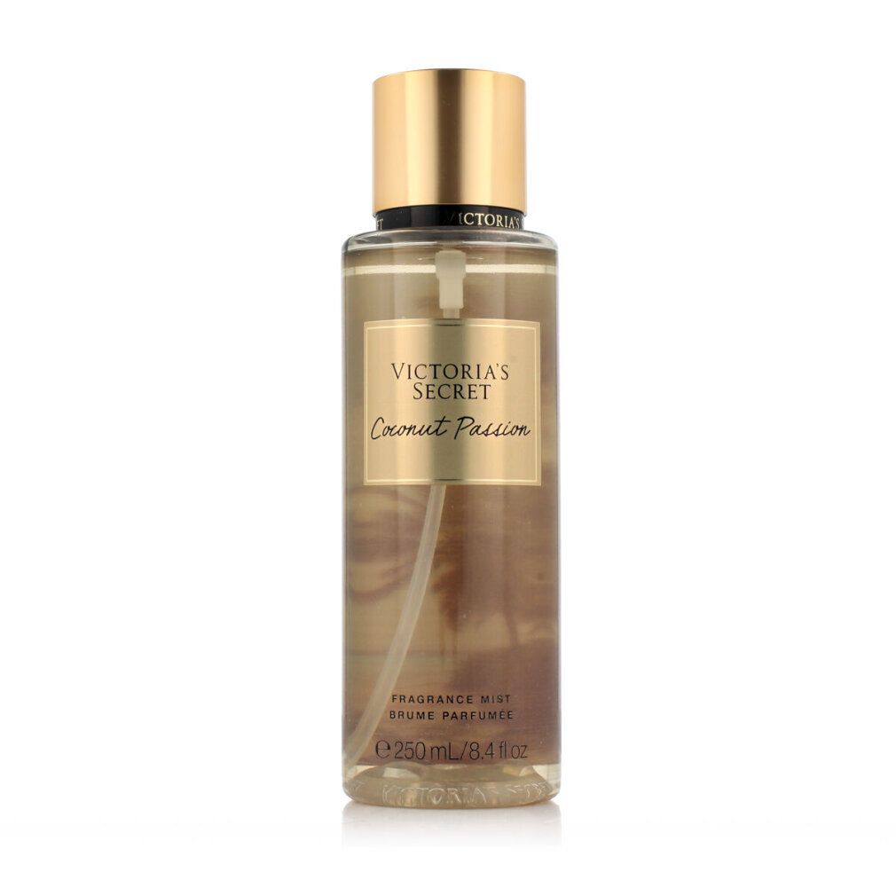Victoria's Secret Körperspray mit goldenem Verschluss und Etikett, auf weißem Hintergrund.