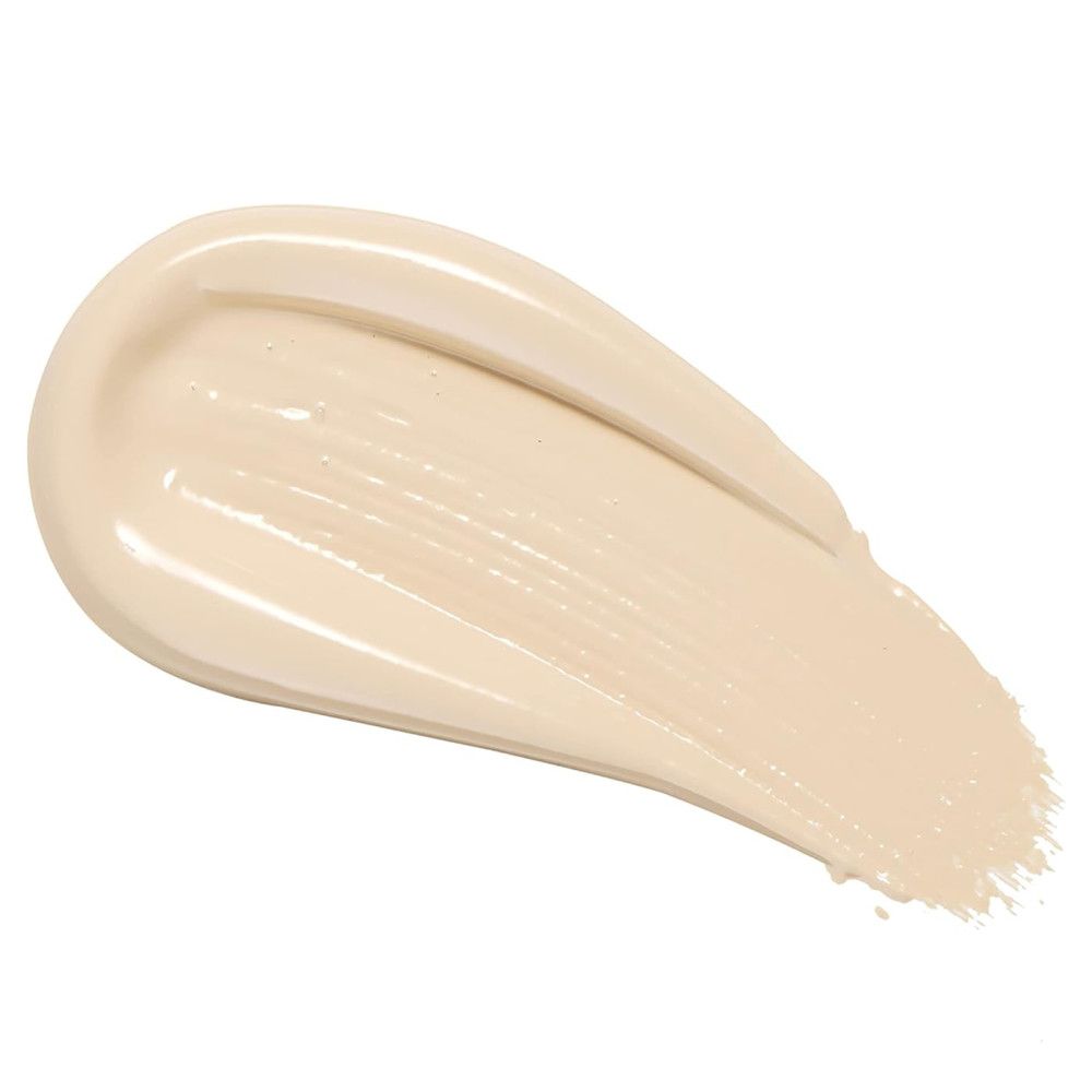 Ein cremefarbener Swatch der Makeup Revolution Cut Crease Canvas Lidschatten-Grundierung. Der Swatch ist glatt und hat eine ovale Form. Die Farbe ist hell und neutral.