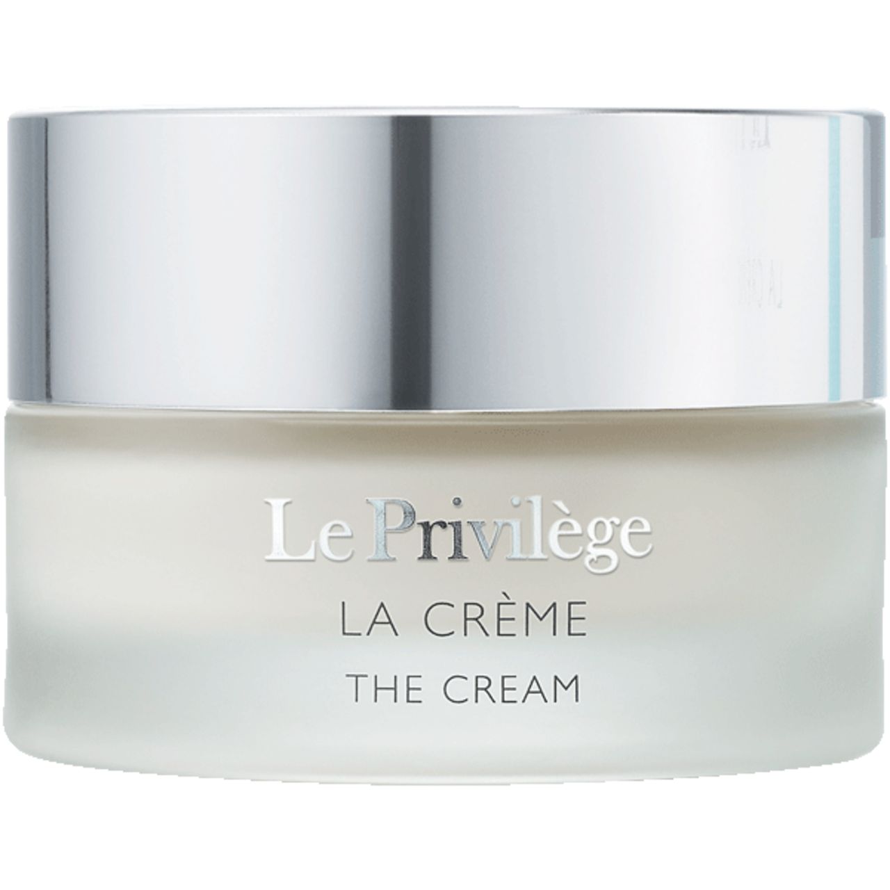 Creme-Tiegel mit silbernem Deckel. Aufschrift: Le Privilège La Crème The Cream.