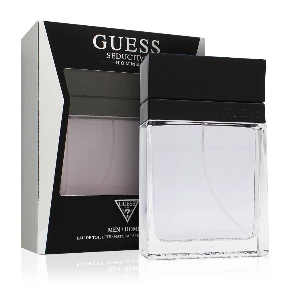 Flakon und Verpackung. Auf der Verpackung steht 'GUESS Seductive Homme'. Flakon mit hellblauer Flüssigkeit. Text: 'MEN/HOMME'.