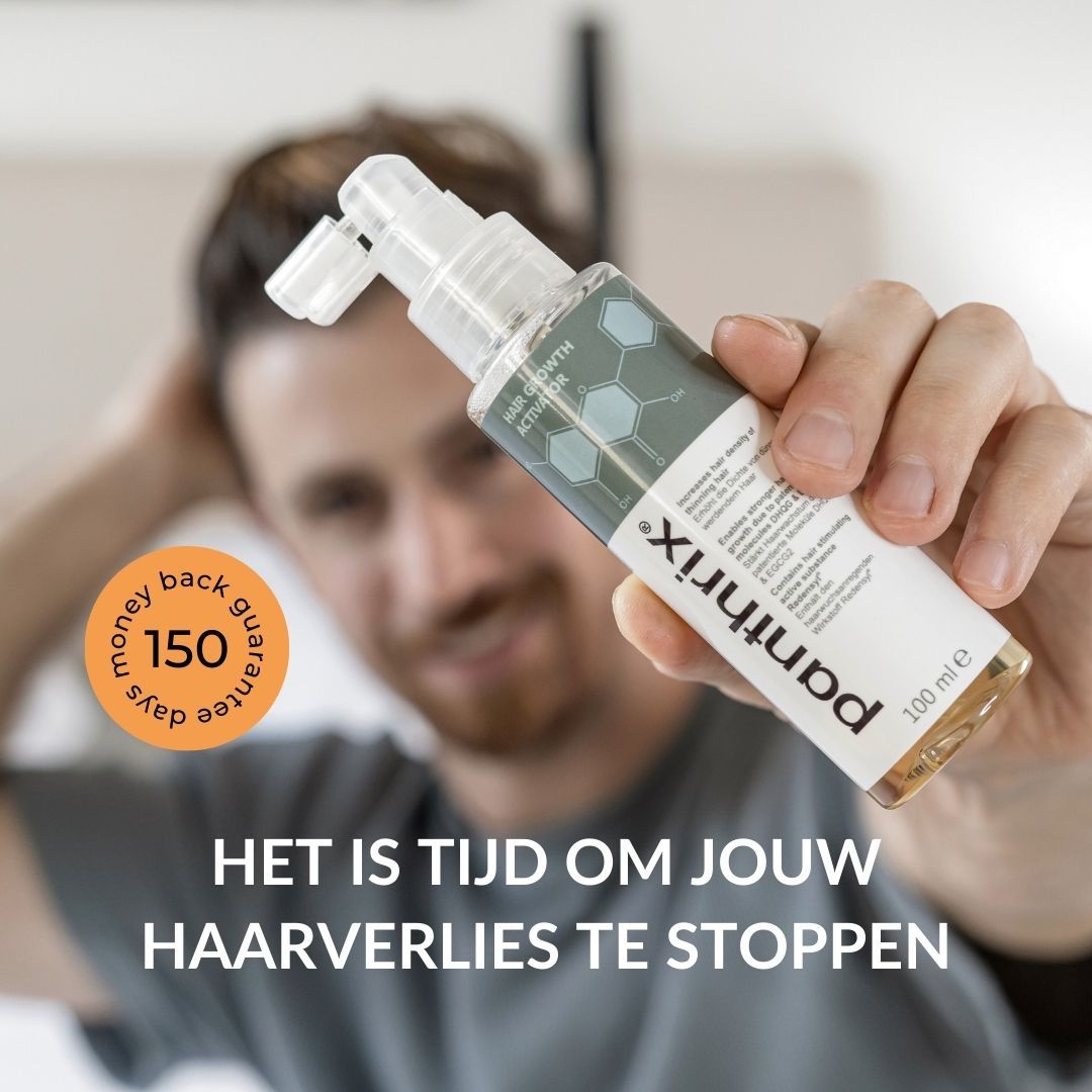 Man houdt productfles vast. Tekst: Het is tijd om je haaruitval te stoppen. 150 dagen geld-terug-garantie.