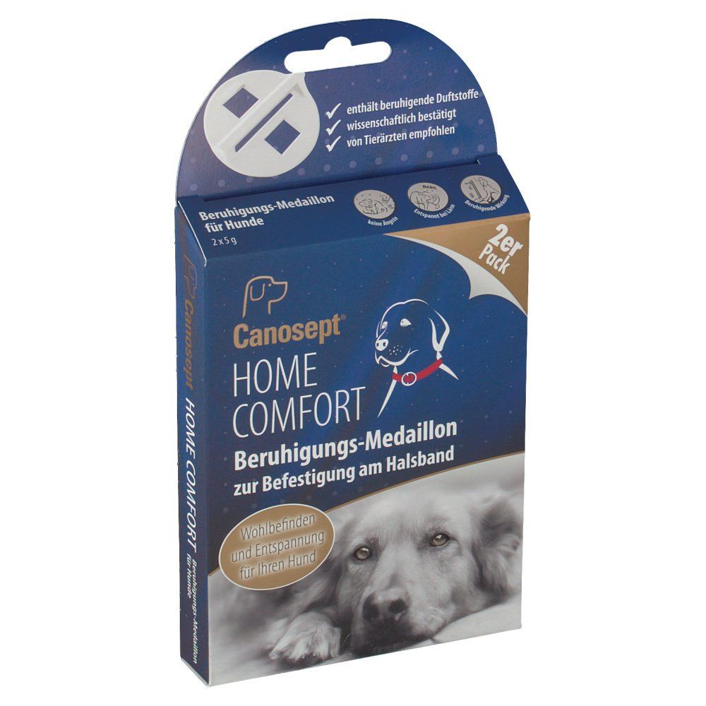 Blaue Produktverpackung mit Canosept HOME COMFORT-Logo. Text: Beruhigungs-Medaillon für Hunde. 2er Pack. Hundefoto.