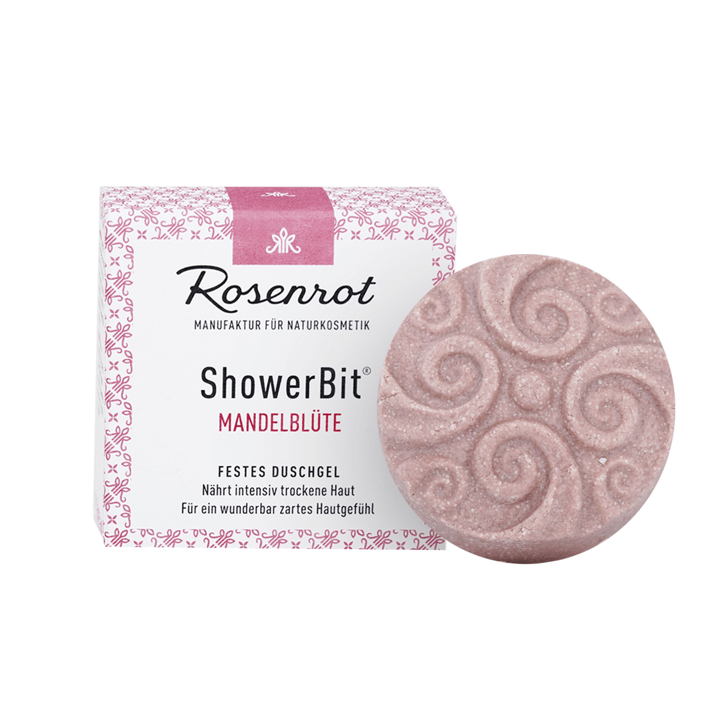 Rundes, festes Duschgel Mandelblüte neben Verpackung. Verpackung mit Logo und Produktbezeichnung. Duschgel mit floralem Muster.
