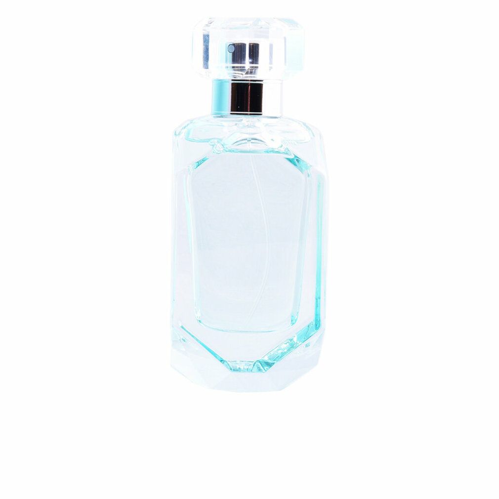 Hellblaues Parfümflakon mit silbernem Verschluss. Klarer, facettierter Glasboden. Transparenter Deckel.