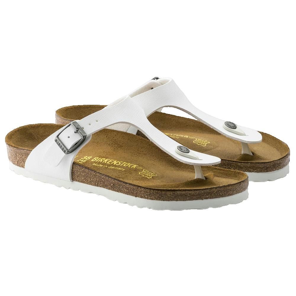 Paio di sandali bianchi con cinturino e fibbia. Plantare in sughero, suola bianca. Scritta Birkenstock.