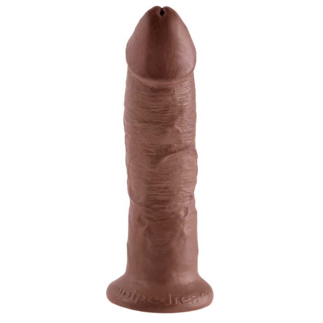 Dildo aus braunem Material. Mit geriffelter Oberfläche und abgerundeter Spitze. Aufschrift "pipedream" am Sockel.