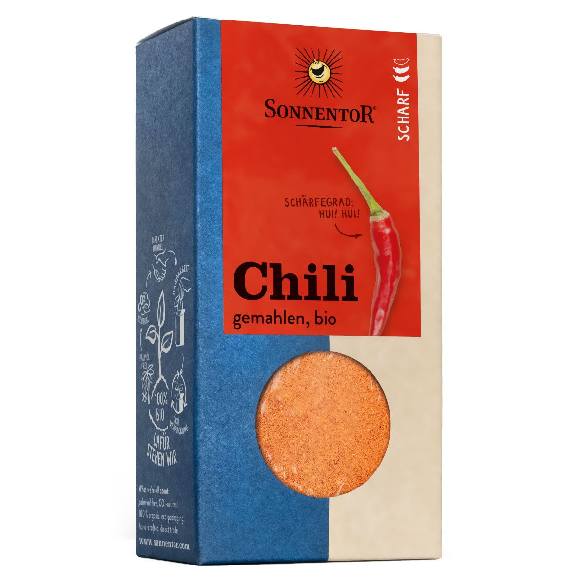 Sonnentor Bio Chili gemahlen. Rechteckige Verpackung mit rotem Feld und Chilischote. Sichtbares Produkt: rotes Pulver.