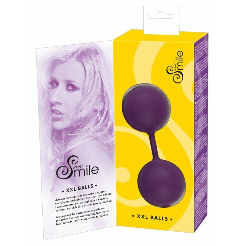 Verpackung mit zwei violetten Kugeln, Stiel mit Schlaufe. Produktname: Sweet Smile. Abgebildet: Frau.