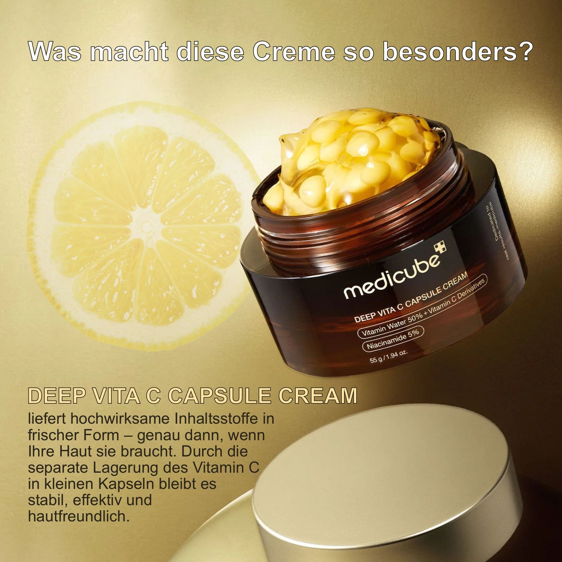 Offener Tiegel mit Creme und gelben Kapseln. Zitrone im Hintergrund. Text: DEEP VITA C CAPSULE CREAM. Enthält Vitamin Water 50% + Vitamin C Derivatives.