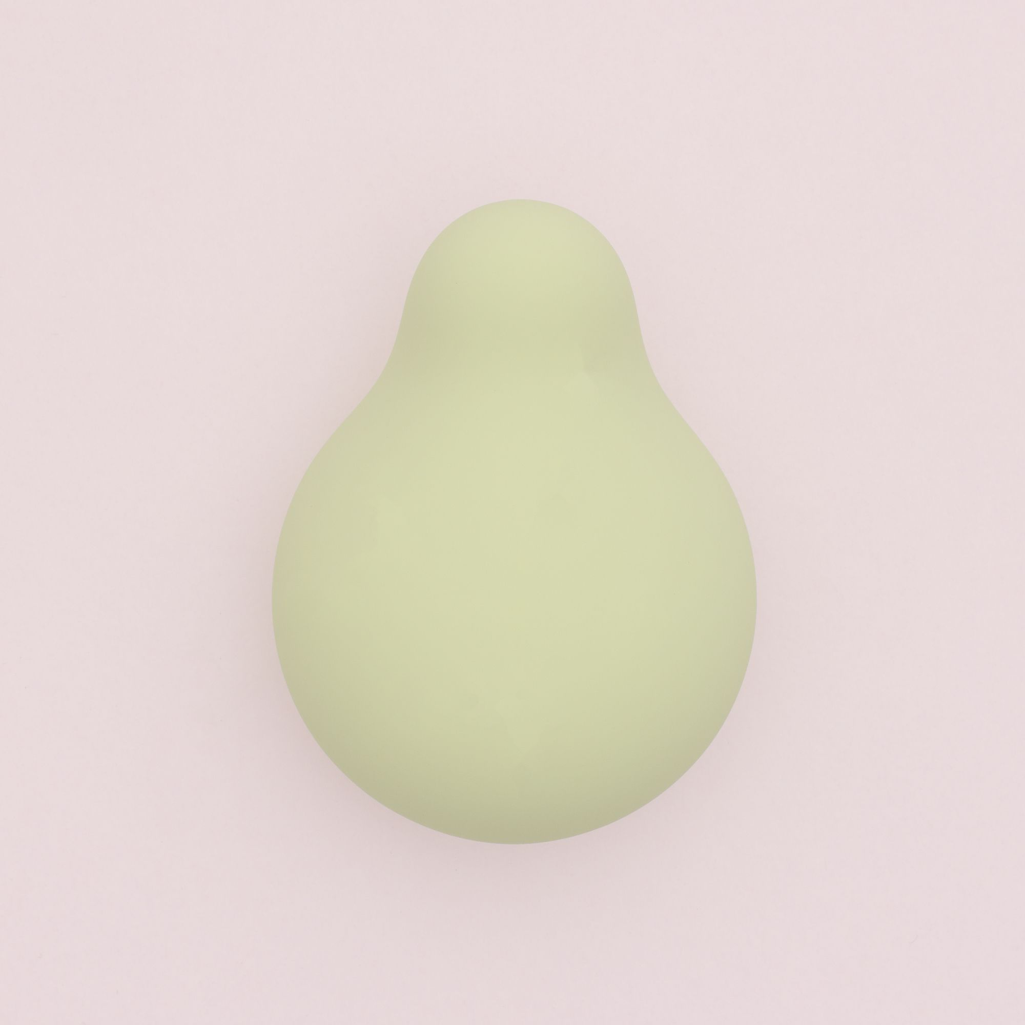 Hellgrüner, birnenförmiger Vibrator. Glatte Oberfläche, abgerundete Form.
