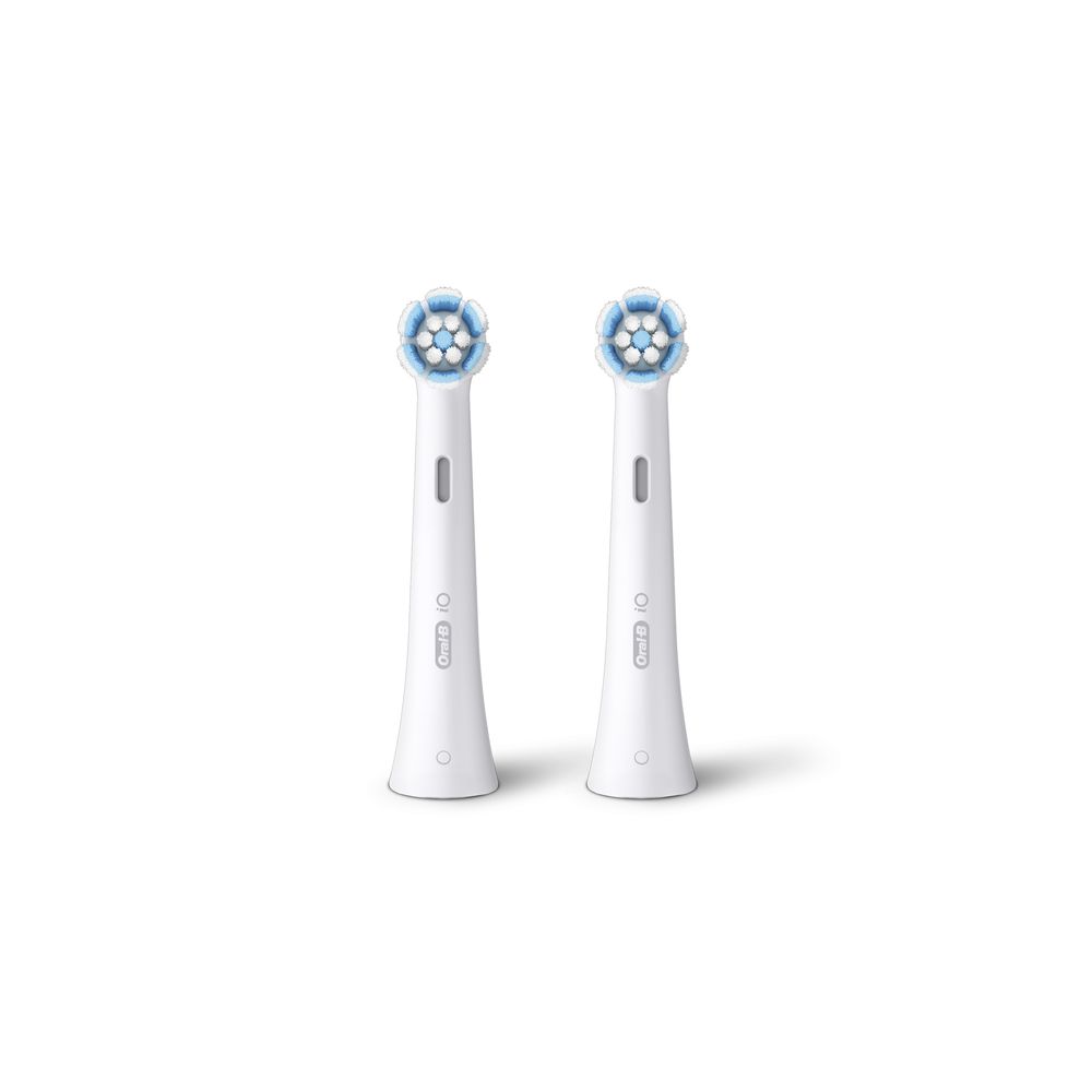 Zwei weiße Aufsteckbürsten. Blaue Borsten. Oral-B Logo.