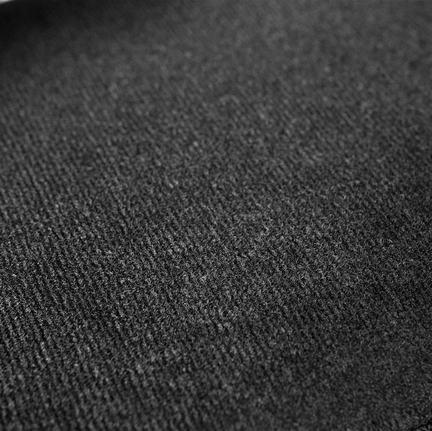 Nahaufnahme des schwarzen, gepolsterten Materials einer Bauchtrainingsschlaufe. Textur.