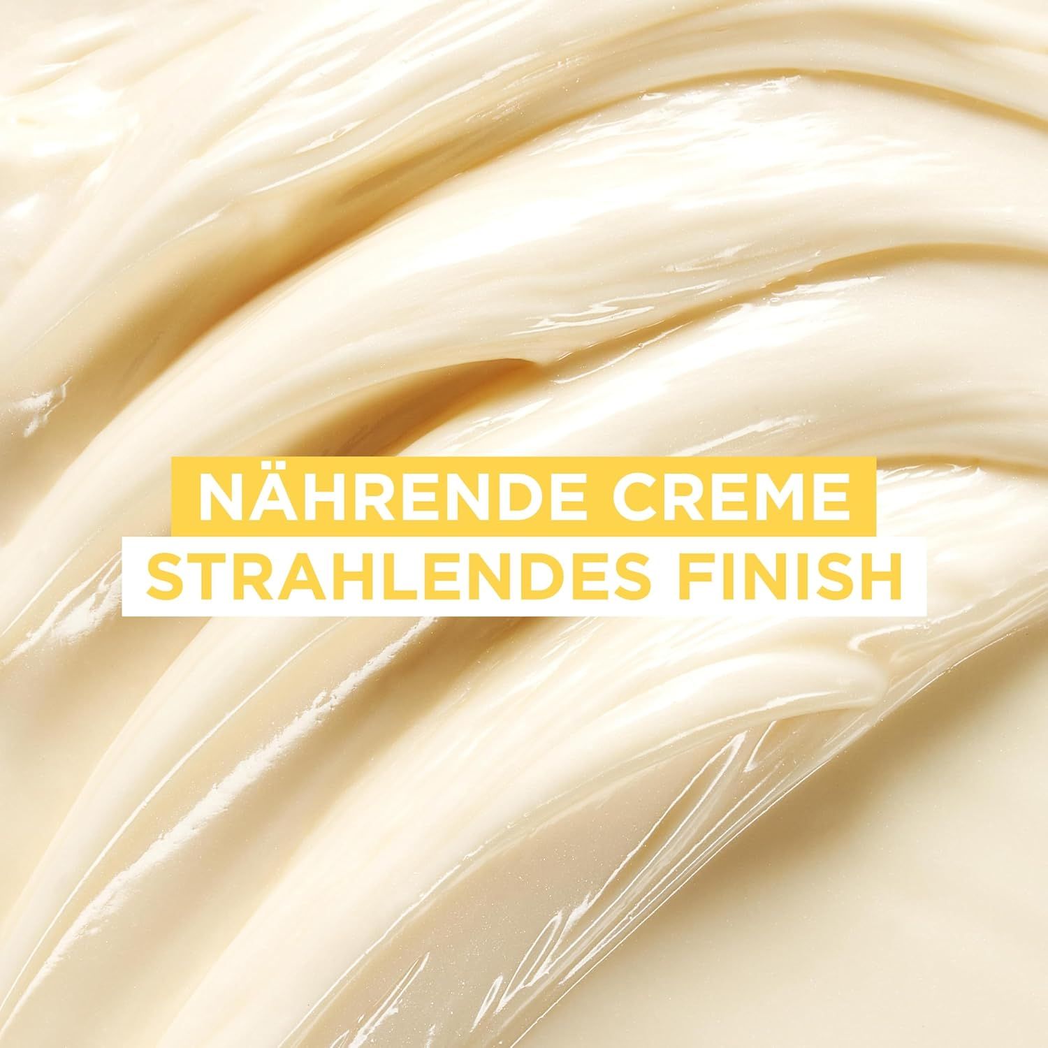 Nahaufnahme von Creme. Text: Nährende Creme, strahlendes Finish. Cremefarbener Hintergrund.