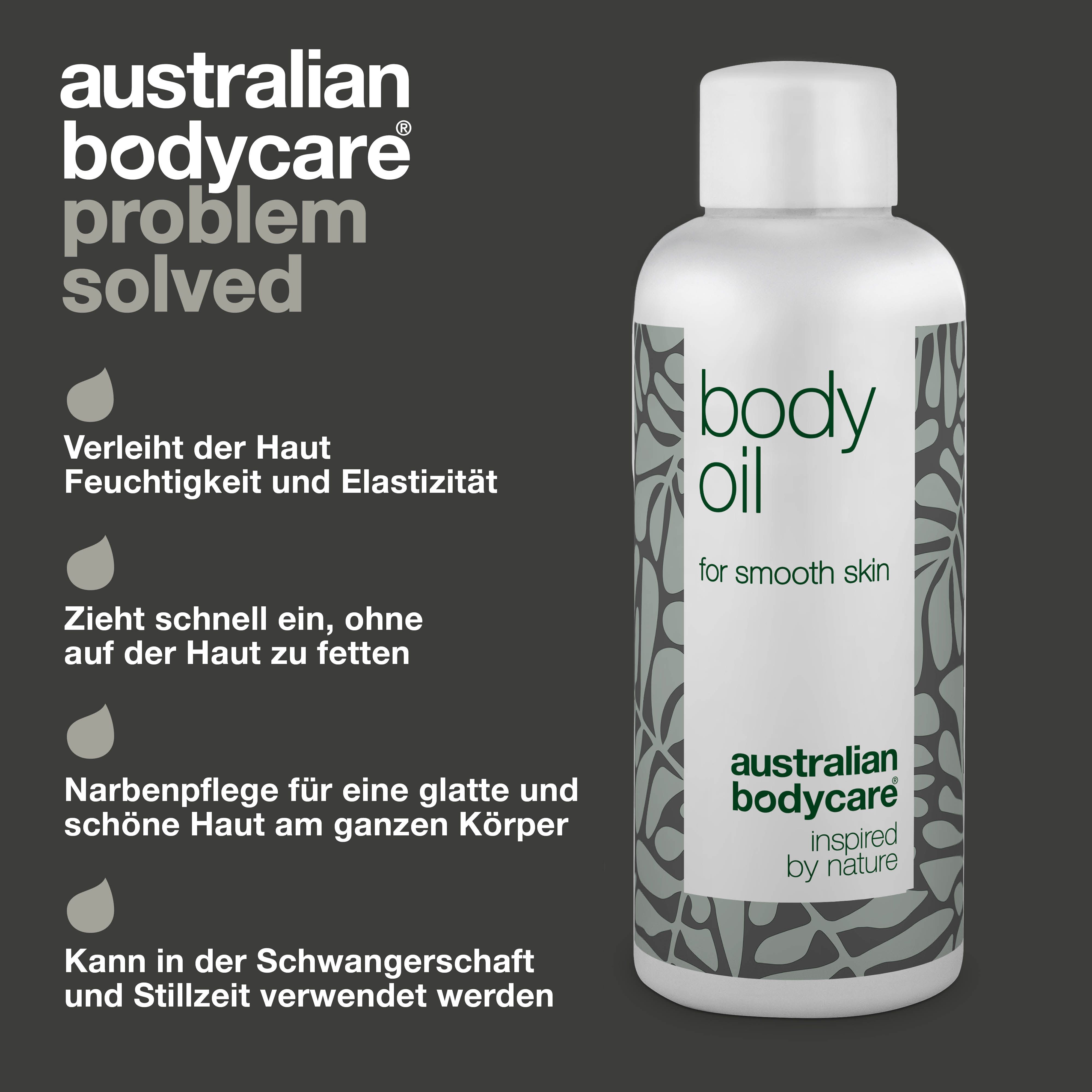 Flasche mit „body oil“. Text: Verleiht Feuchtigkeit und Elastizität, zieht schnell ein, Narbenpflege. Graues Design.