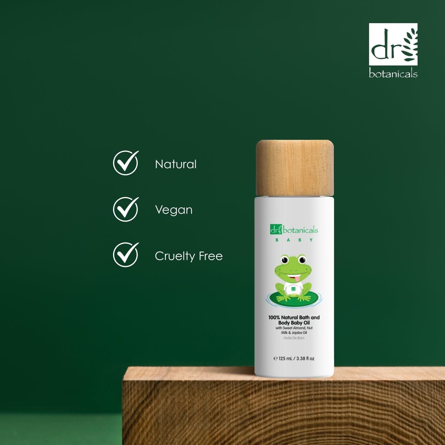 Flasche auf Holzblock. Text: Natural, Vegan, Cruelty Free. Flasche mit Frosch-Illustration.
