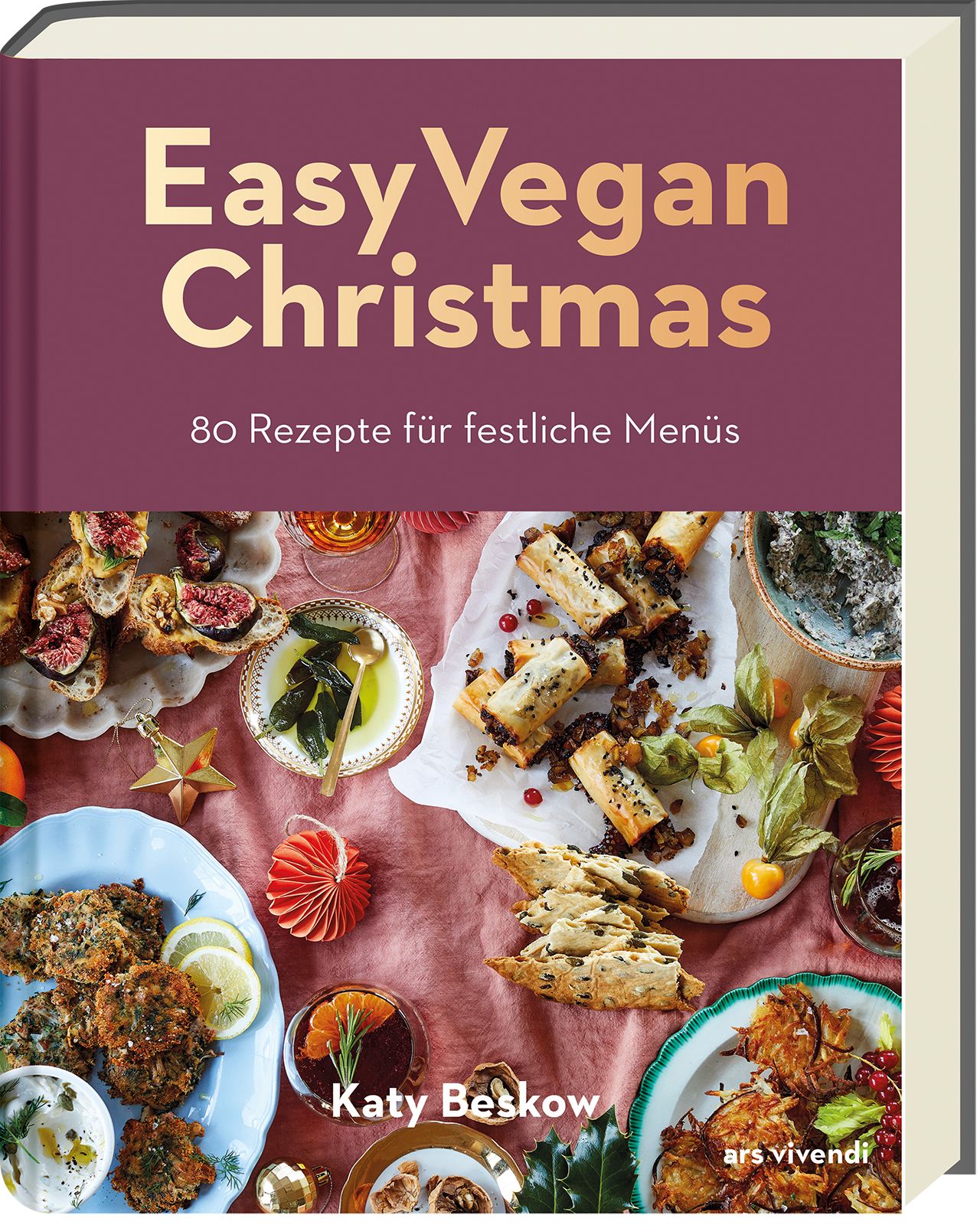 Buchcover: "Easy Vegan Christmas" mit goldener Schrift. Darunter: 80 Rezepte für festliche Menüs. Autor: Katy Beskow.
