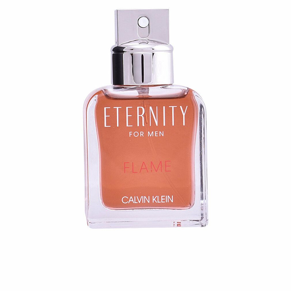 Glasflakon mit orangefarbener Flüssigkeit. Silberner Zerstäuber. Text: ETERNITY FOR MEN FLAME, CALVIN KLEIN.