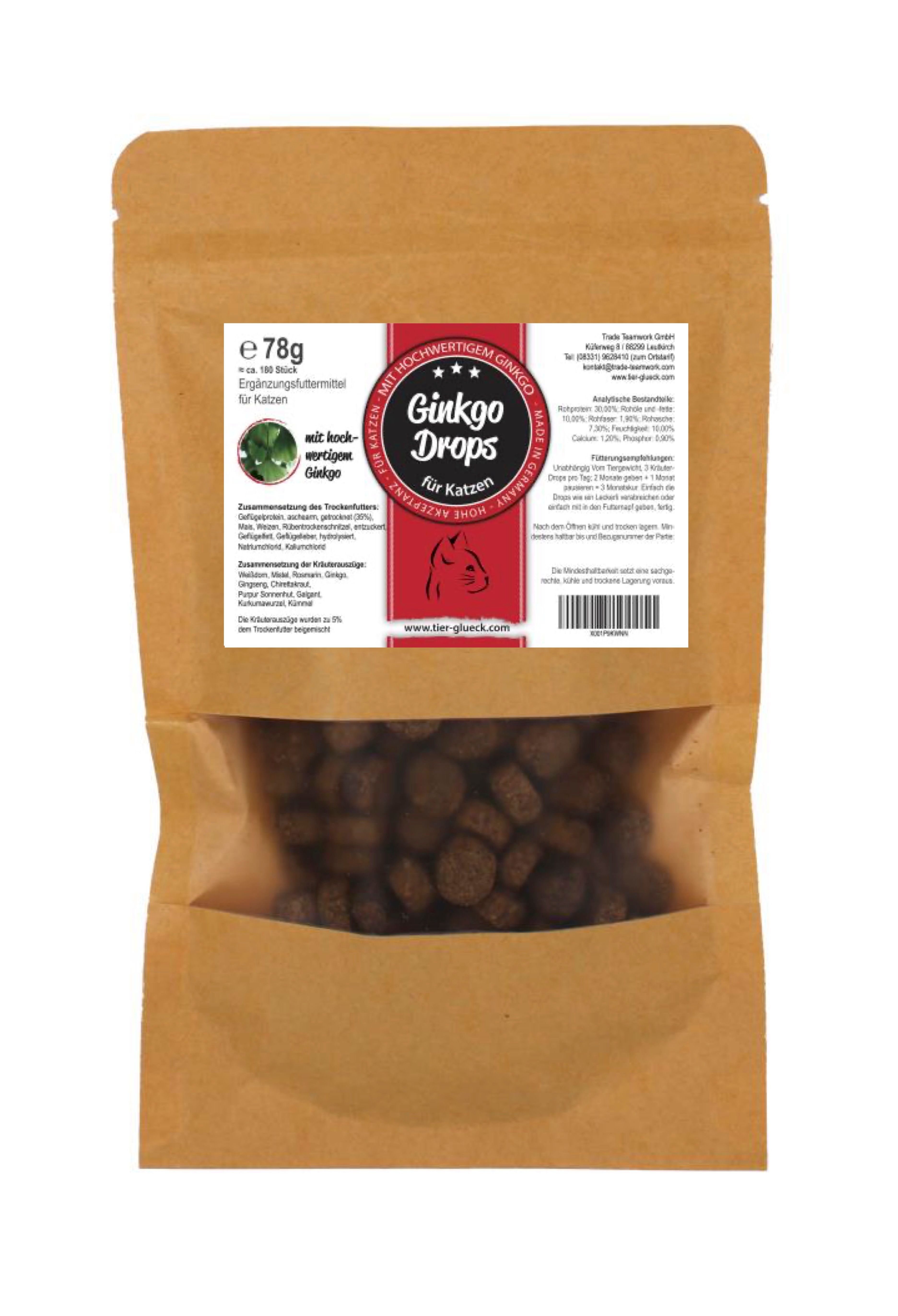 Beutel mit Ginkgo Drops für Katzen. Sichtbares Fenster zeigt braune Tropfen. Aufkleber mit Produktinformationen und Logo.