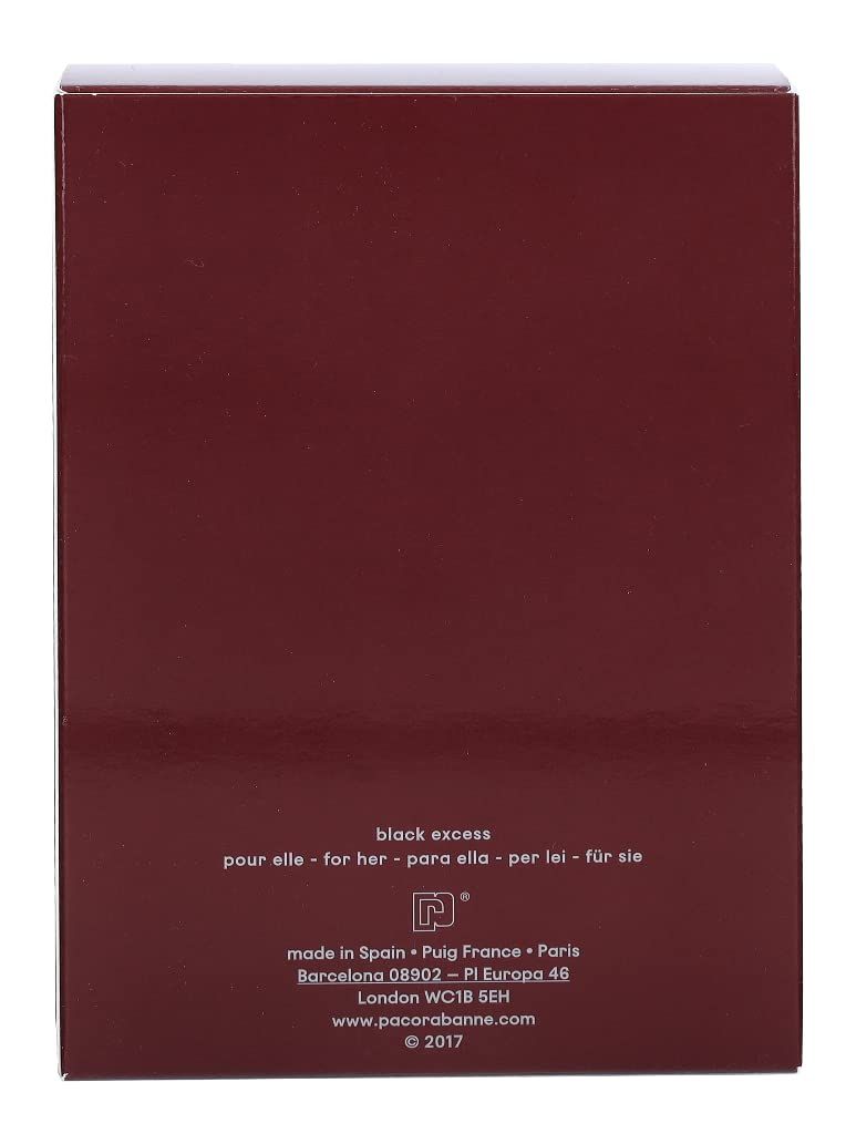 Rückseite der dunkelroten Schachtel. Text in mehreren Sprachen, darunter "black excess".