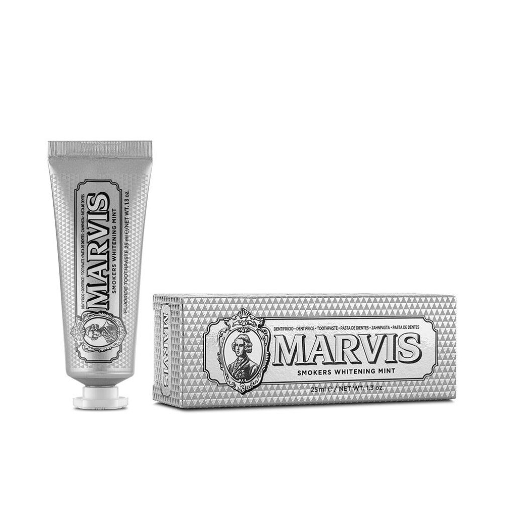 Zahnpasta-Tube und Schachtel. Aufschrift: MARVIS Smokers Whitening Mint. Silberfarben. Weiße Kappe. Verpackung.