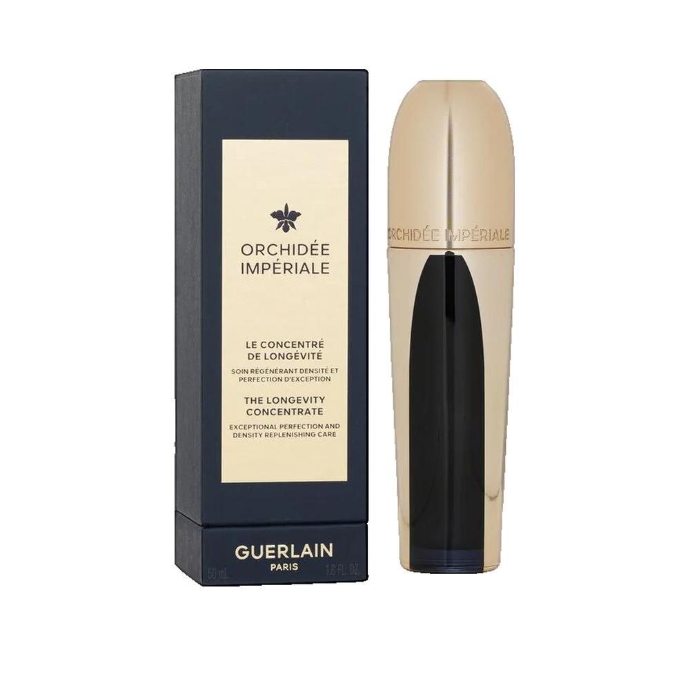 Goldfarbene Flasche neben einer dunkelblauen Schachtel. Aufschrift: ORCHIDÉE IMPÉRIALE, GUERLAIN.