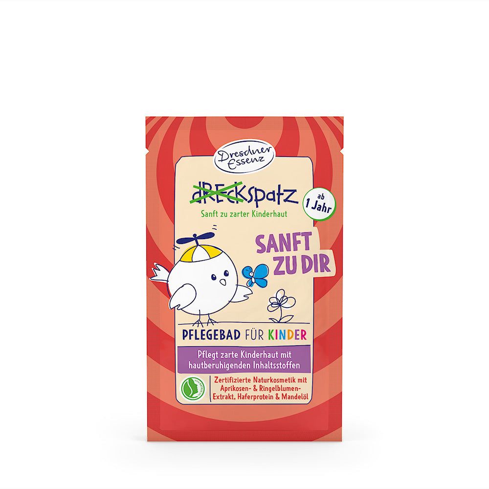 Sachet de bain pour enfants. Texte: Sanft zu Dir, Pflegebad für Kinder. Logo: Dresdner Essenz, cosmétiques naturels.