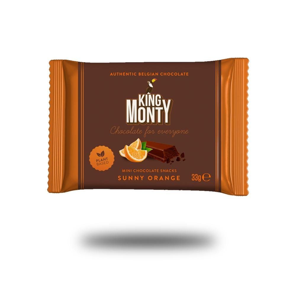 Verpackung King Monty Sunny Orange. Braune Schokoladentafel mit Orangen- und Minzabbildung. Aufschrift: Mini Chocolate Snacks, 33g.
