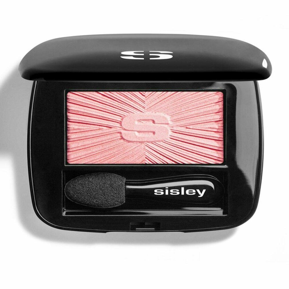 Geschlossene schwarze Lidschatten-Kompaktpuder mit Sisley-Logo. Rosa Lidschatten mit Sisley-Logo und Applikator.