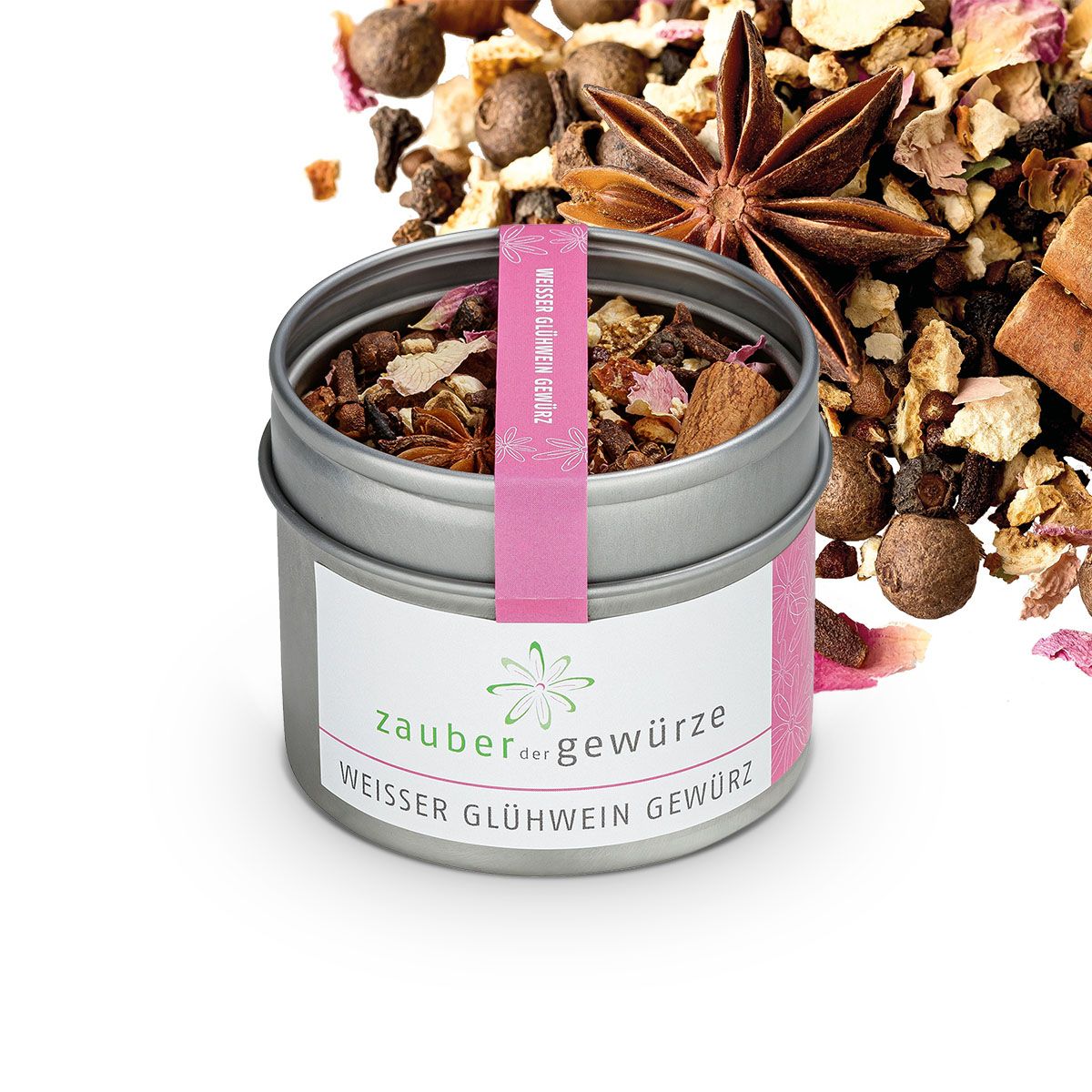Runde Metallbox mit Gewürzen. Rosa Etikett mit Text. Aufschrift: Zauber der Gewürze Weisser Glühwein Gewürz.