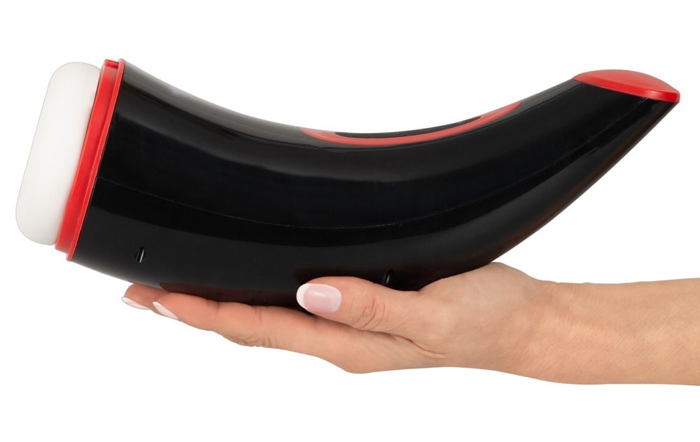 Schwarzes Masturbationsgerät mit roter Akzentfarbe und weißer Öffnung, in einer Hand gehalten.